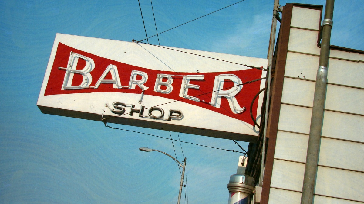 barbershop-business-plan A barbershop sign is closed, letting know clients its closed for the year as the owners plan their 2026 Barbershop business plan.